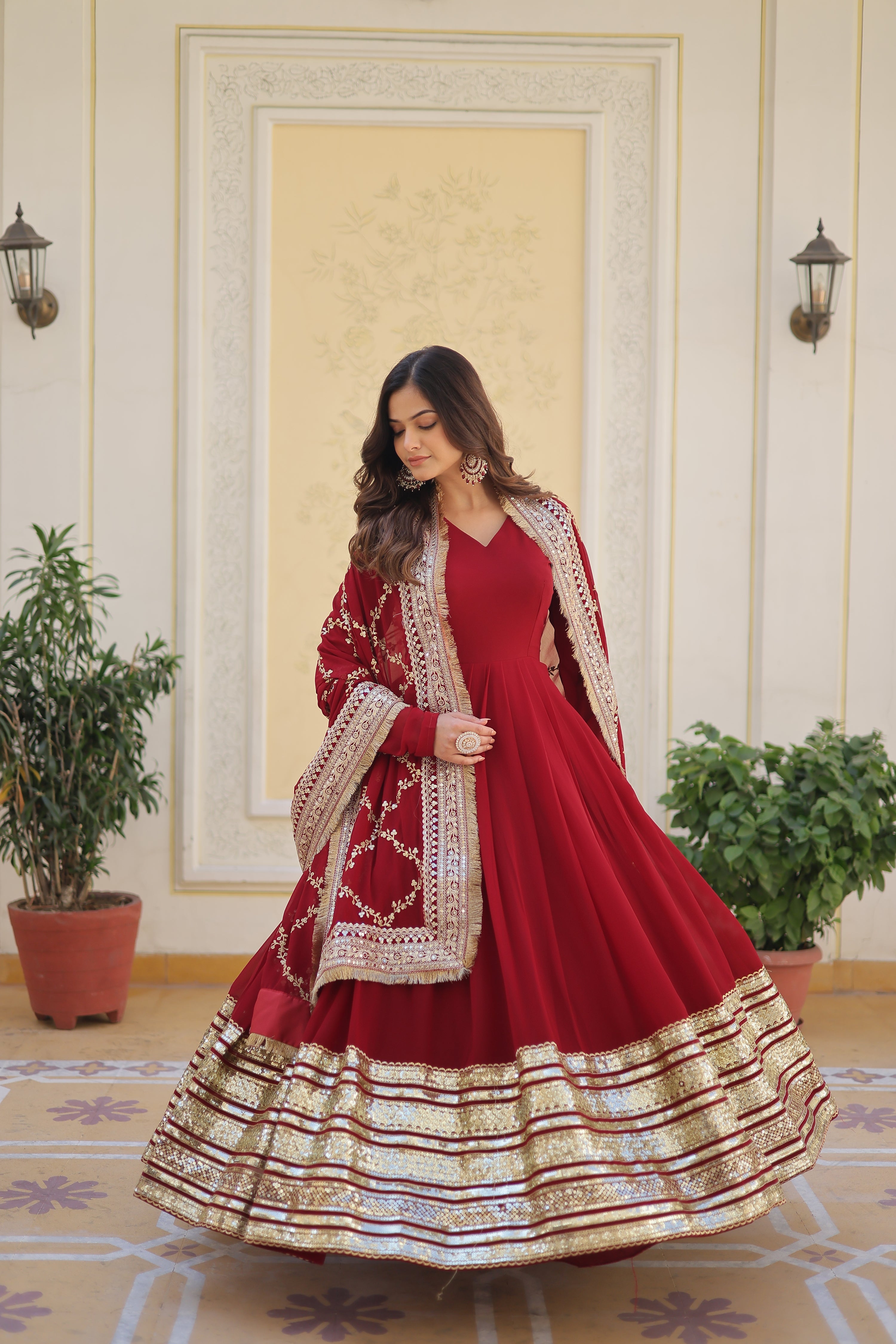 MAROON FAUX BLOOMING WITH EMBROIDERY ZARI SEQUINS-WORK GOWN